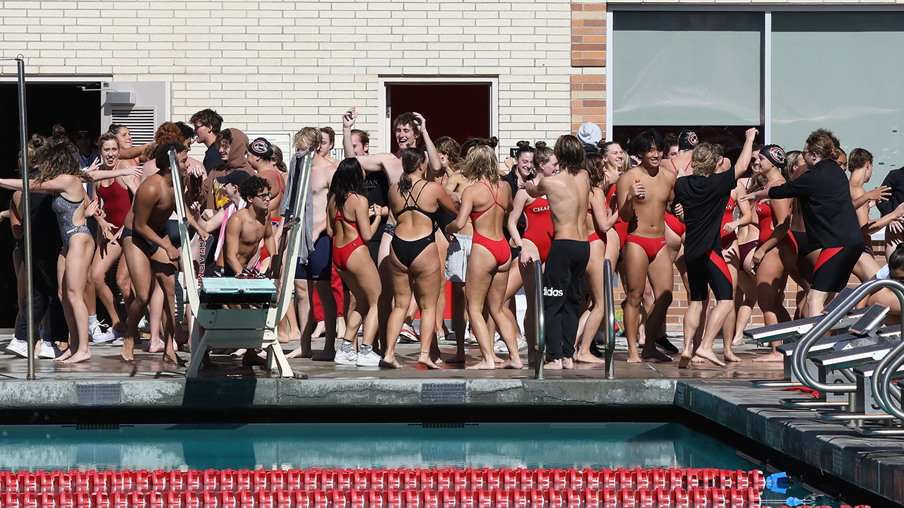 Swimming & Diving team celebrates.