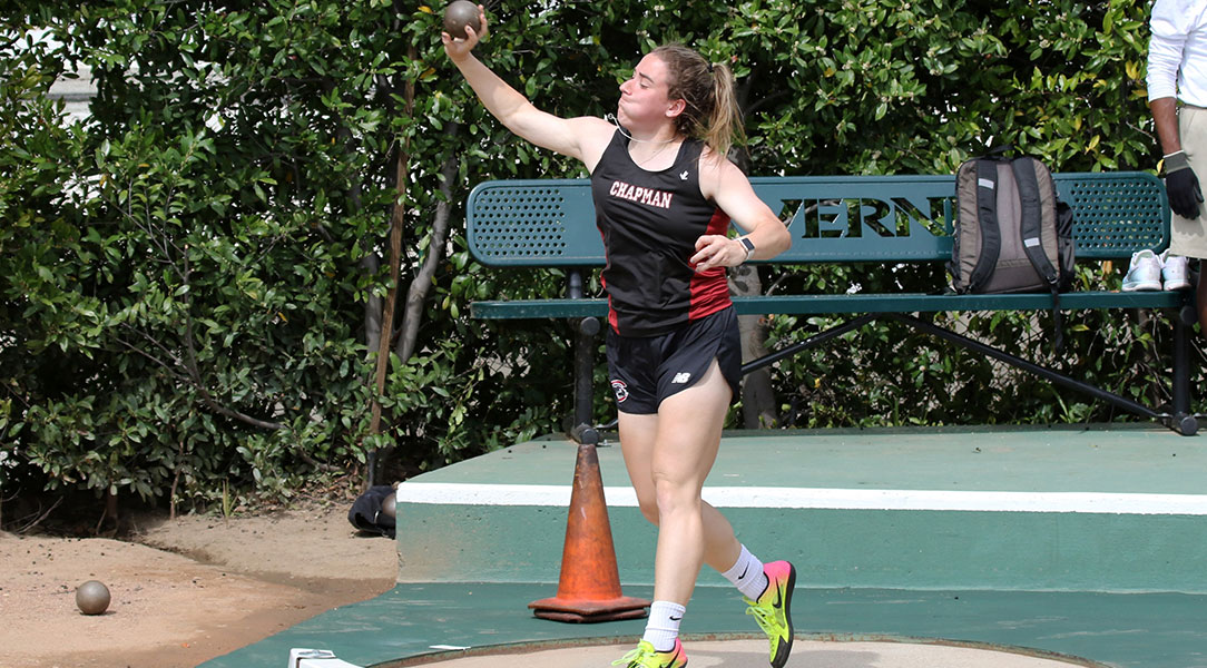 Lauren Miller tosses the shot put.