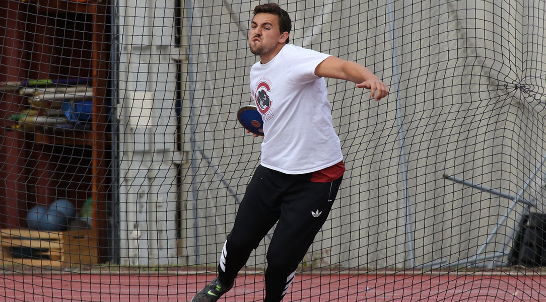 Cedric Cole winds up to throw the discus.