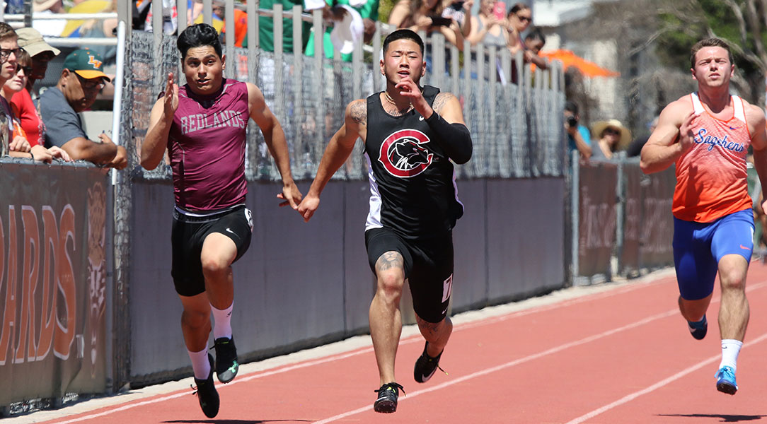 Derek Ohara sprints across the finish line.