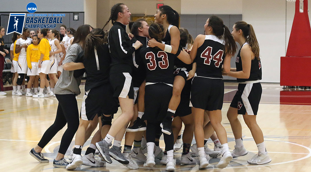The team celebrates its SCIAC Championship at midcourt.