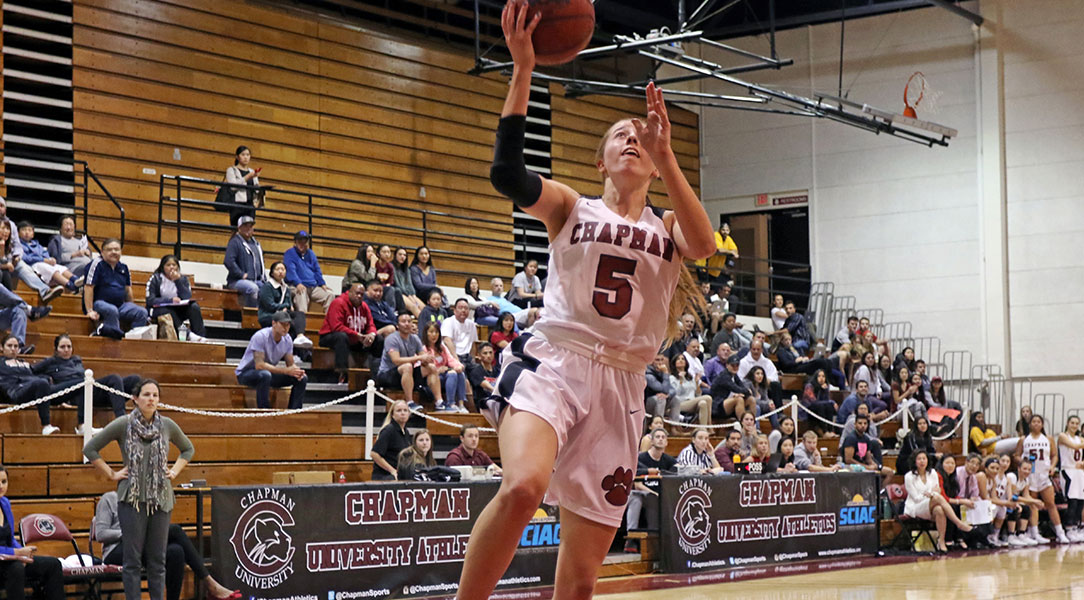 Lucy Criswell shoots a layup.