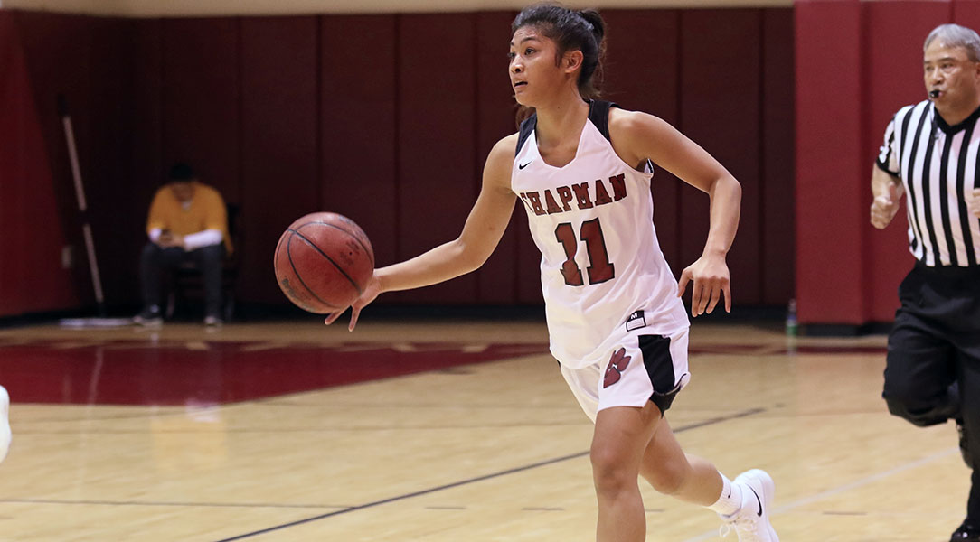 Jaryn Fajardo dribbles down the floor.
