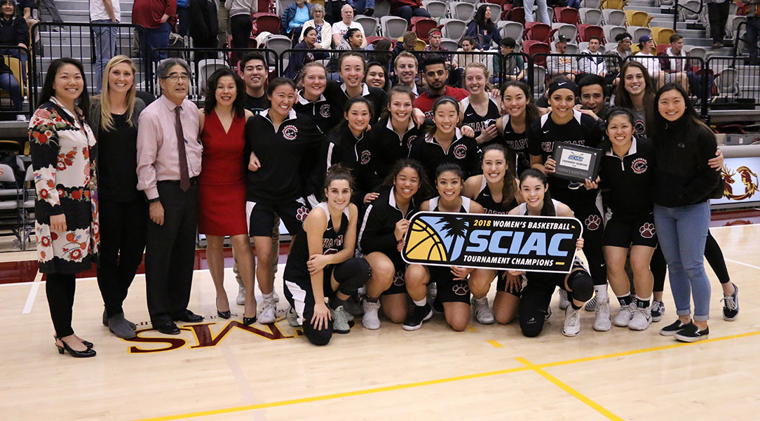 The Panthers pose for a picture with the champions sign
