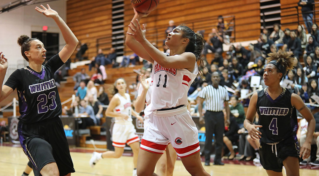 Jaryn Fajardo drives to the basket.