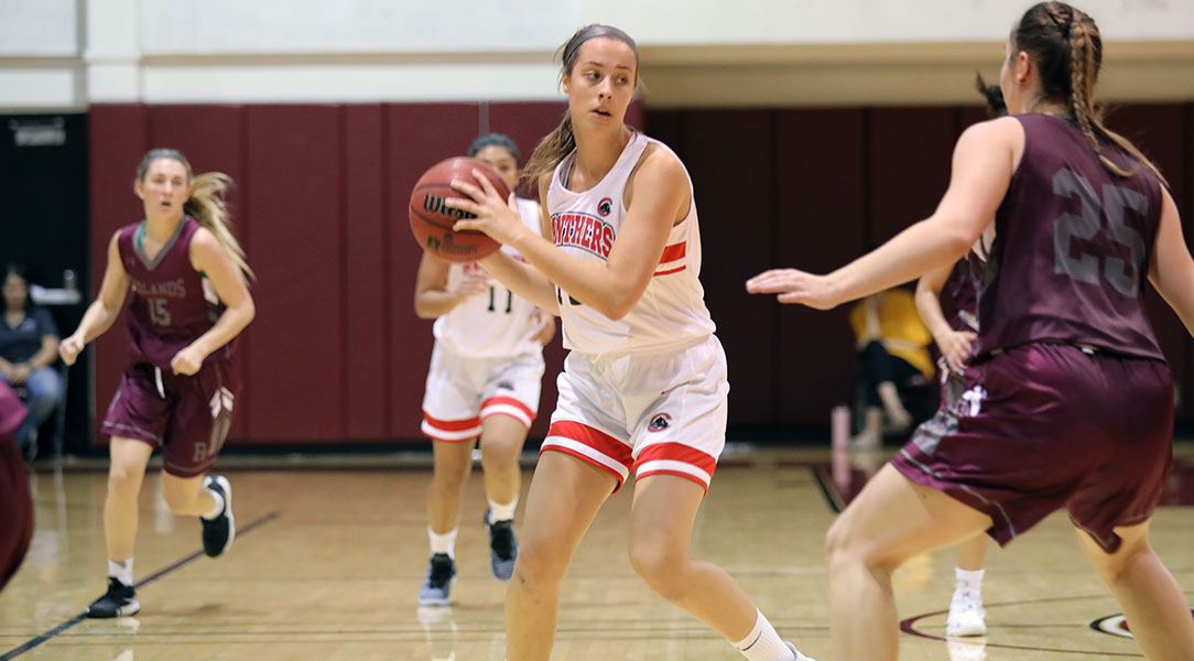 Julia Strand looks for a pass.
