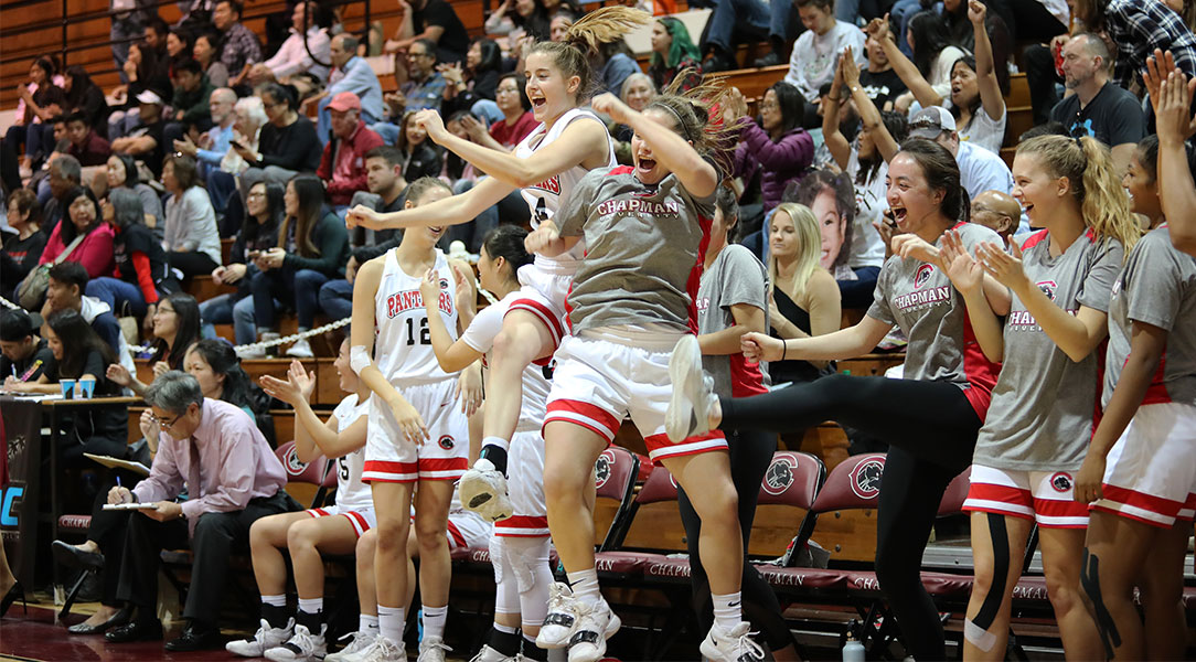 The Chapman bench celebrates a basket.