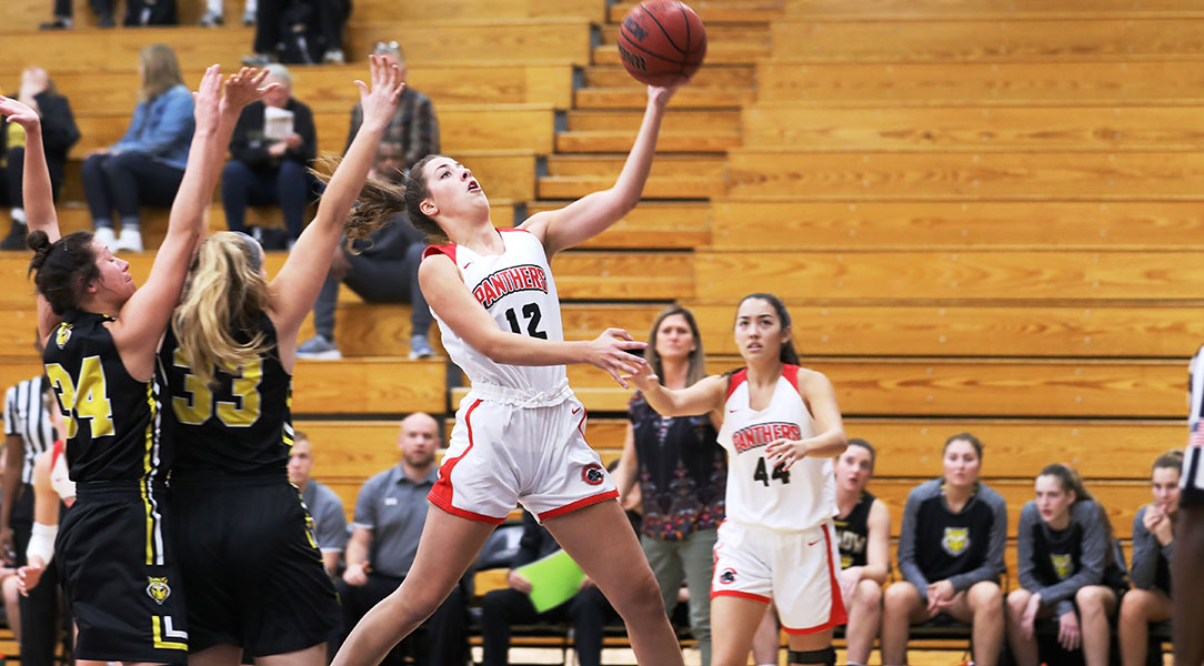 Julia Strand drives to the basket.