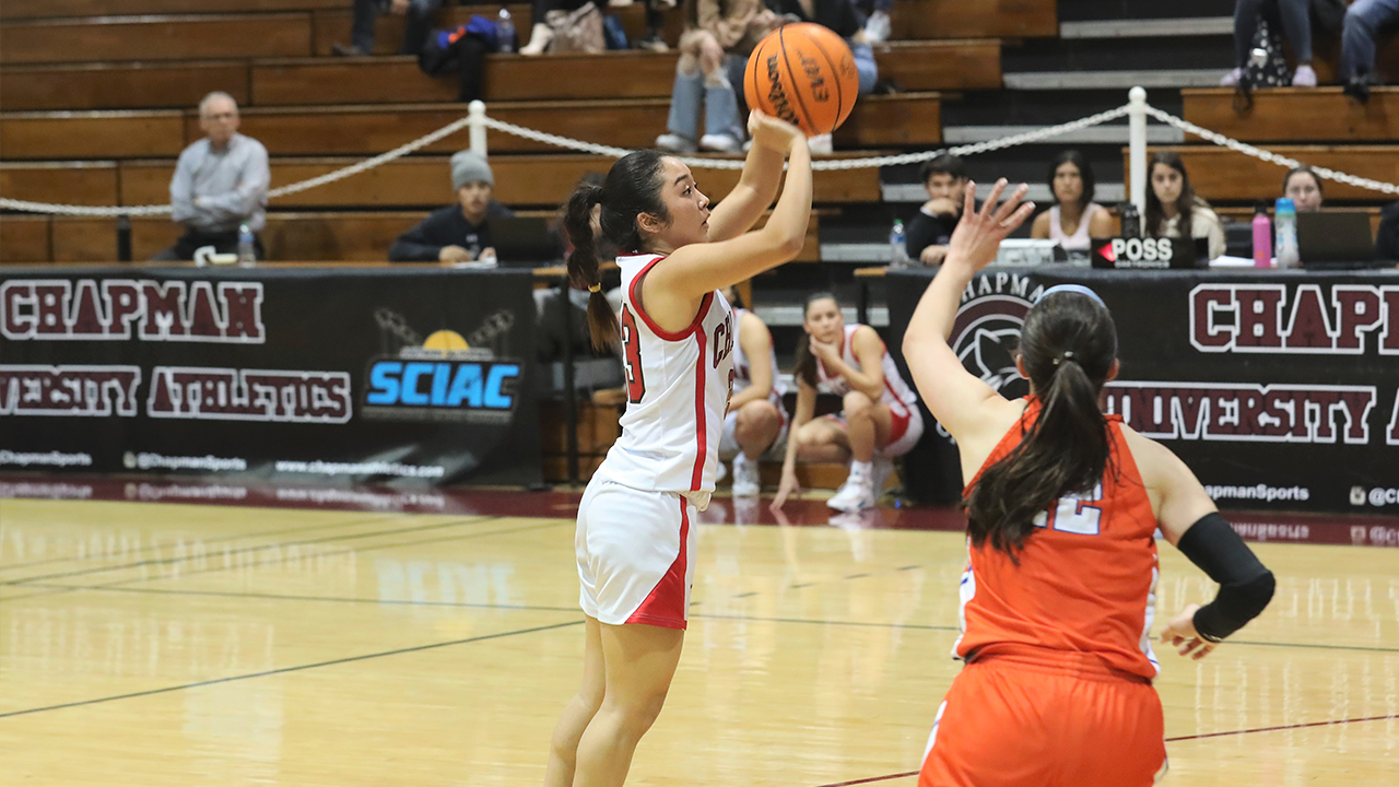 Katie Kubo shoots a jumper,