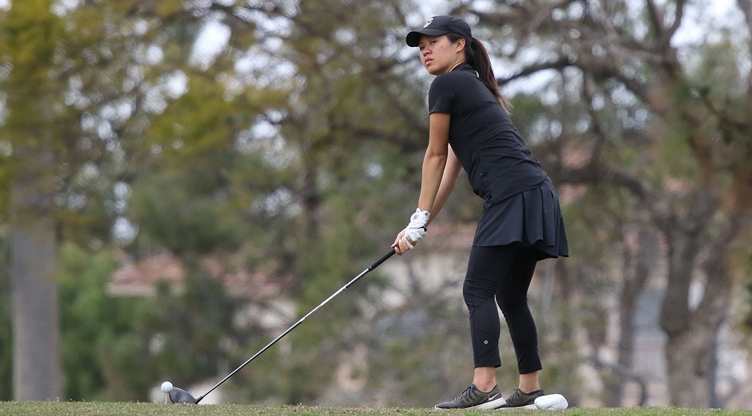 Marisa Bhanubandh lines up her tee shot.