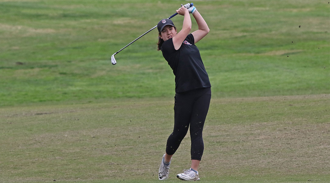 Kristen Lee hits a shot from the fairway.