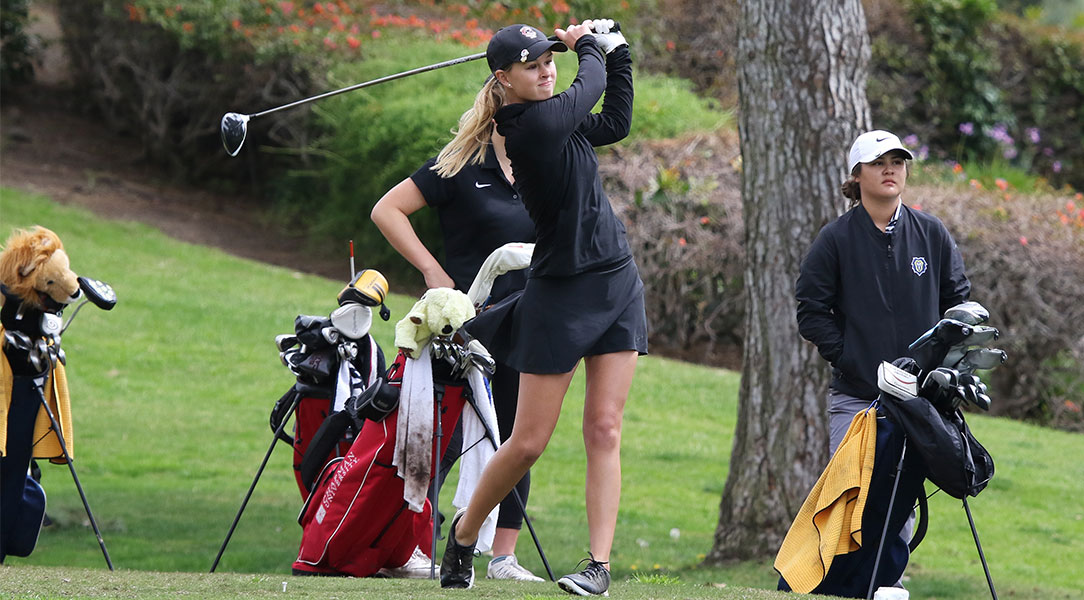 Lauren Settle finishes her swing.