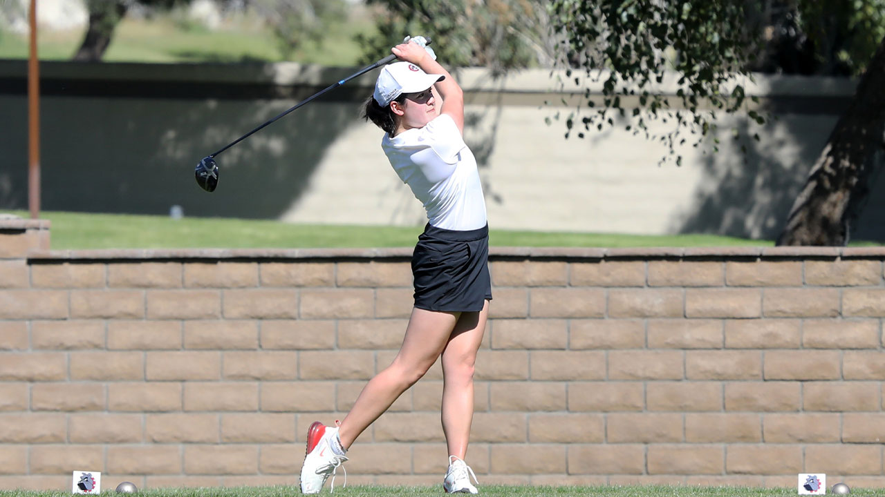Kristen Lee hits a tee shot.