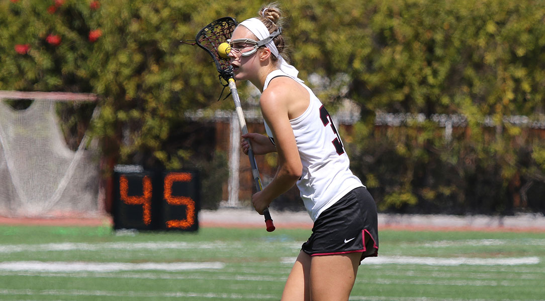 Stacey Zuppa looks to pass the ball.