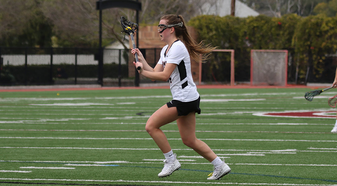 Meg Hanson looks for a pass.