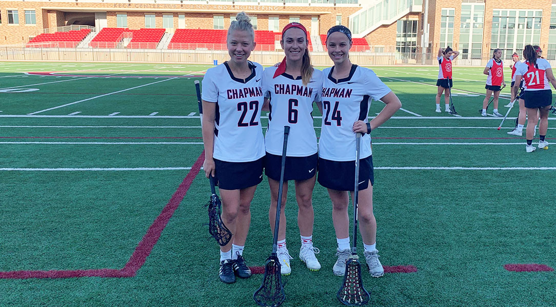 Chapman's three seniors smile.