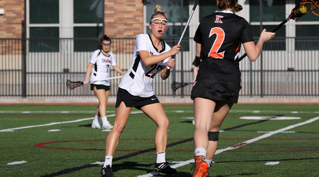 Shelby Thompson defends a player from Kalamazoo.