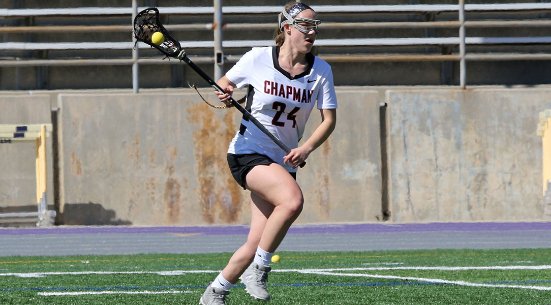 Danielle Zahn runs up the field with the ball.