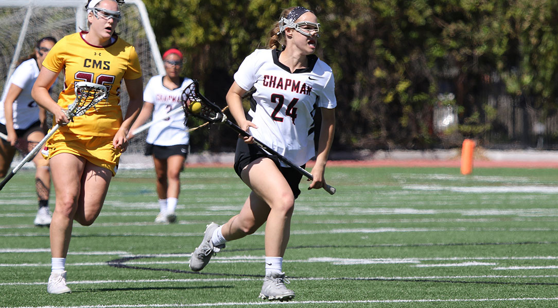 Danielle Zahn sprints away from defenders.