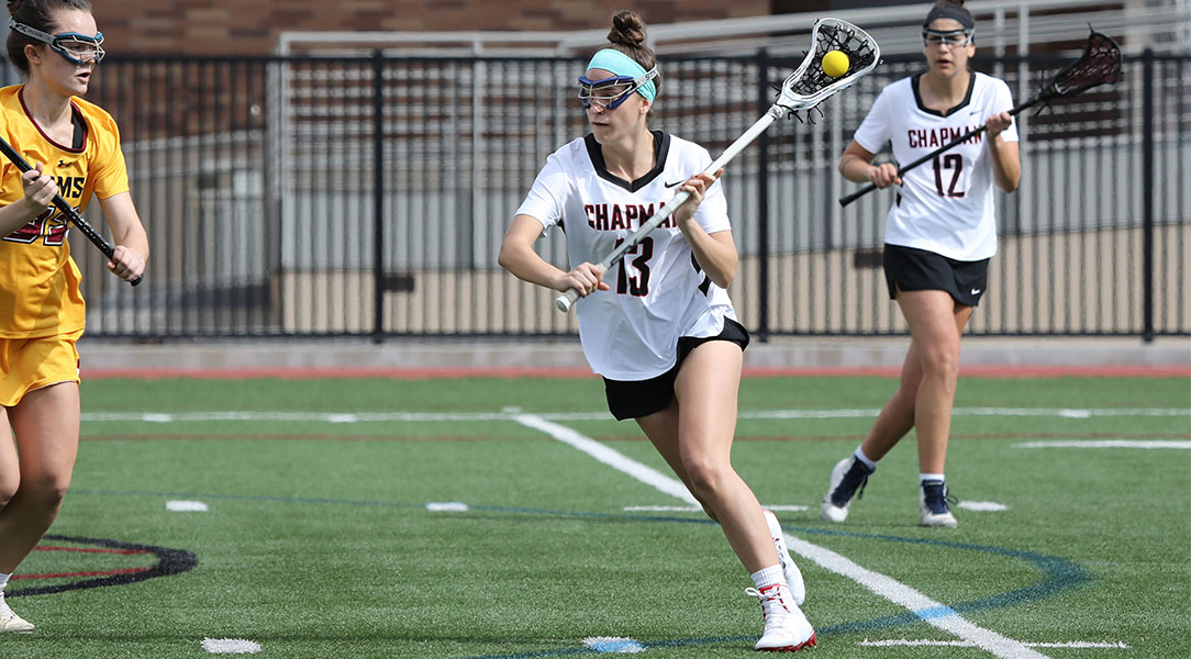 Corinn Valeri runs down the lacrosse field.