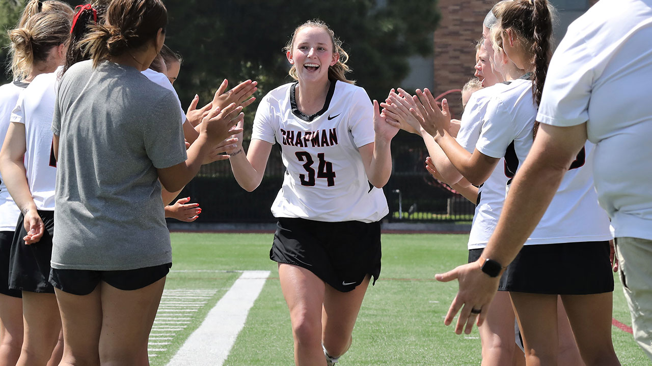 Jessica Ricketts high fives teammates as she is introduced.