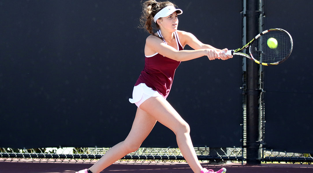 Isabella Oedekerk swings for the ball.