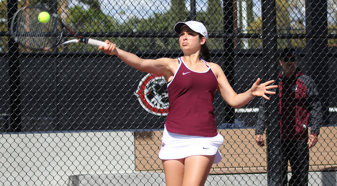 Alisa Ogranovich hits the ball.