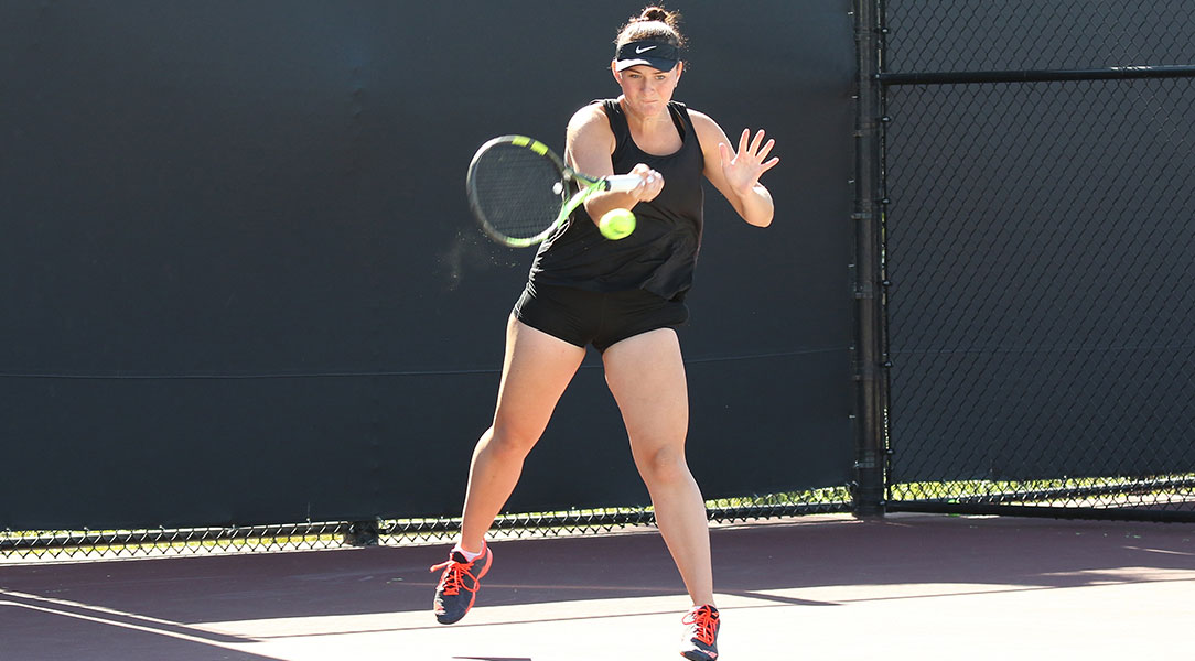 Vasilisa Trofimova hits a forehand.