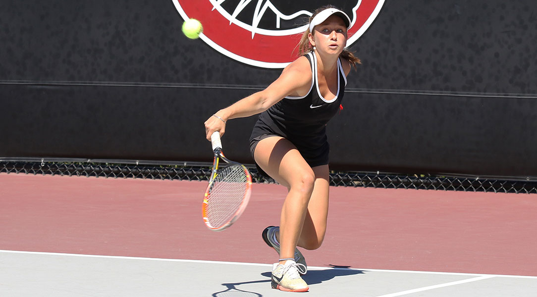 Anna Kaplan returns the ball.