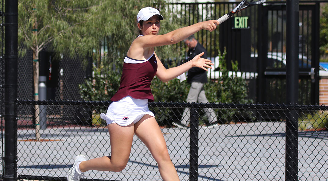 Alisa Ogranovich hits the ball.
