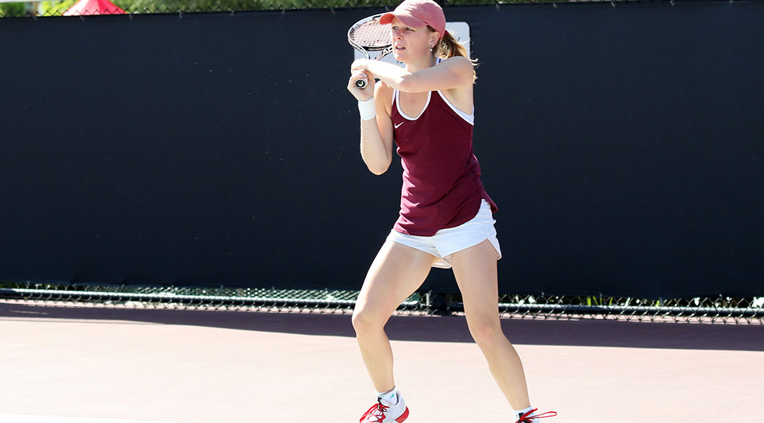 Madison Ross returns the ball.