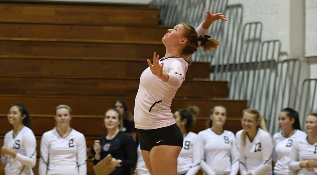 Jessi Lumsden goes up for a serve.