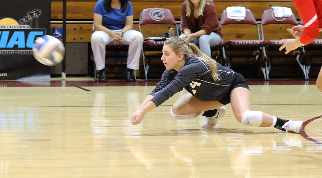 Cat Helgeson goes down for a dig.
