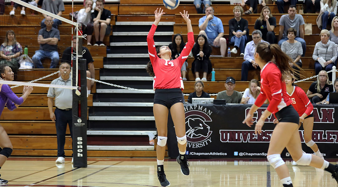 Sophie Srivastava sets a volleyball.