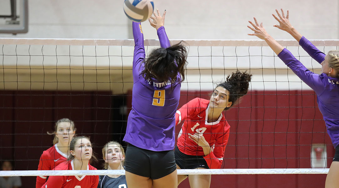 Sophie Srivastava hits through the block.