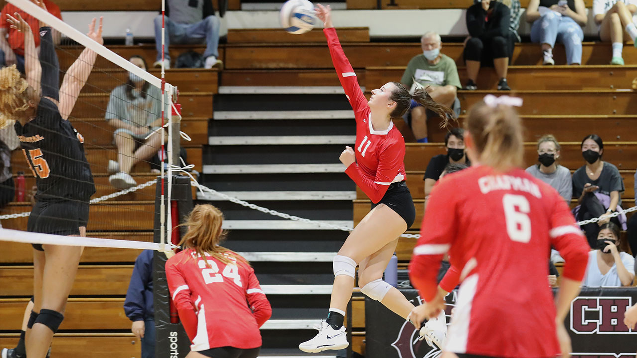 Leighton Gagnon hits a volleyball.