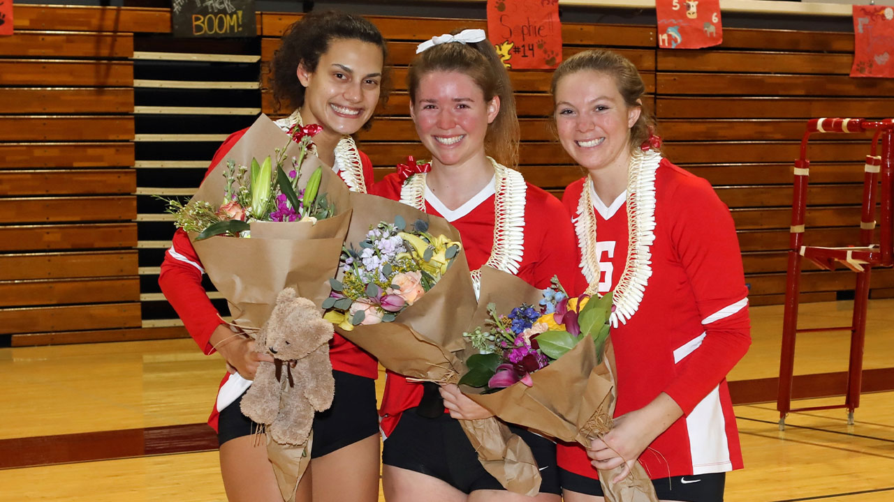 The Chapman seniors stand together.