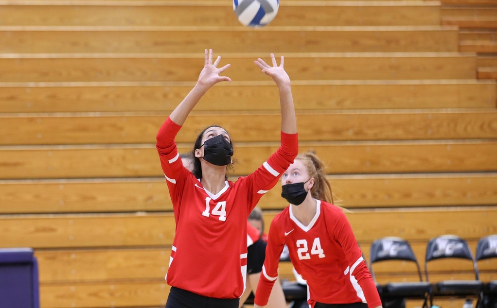 Sophie Srivastava sets the volleyball.