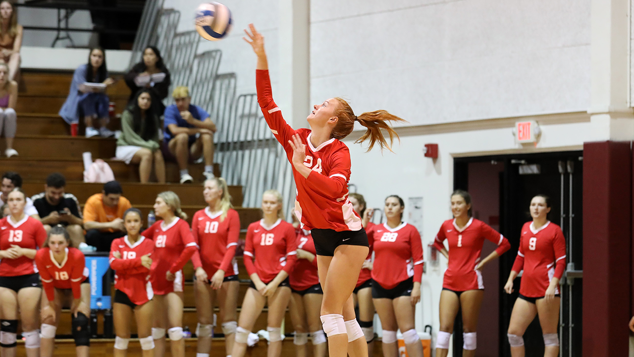 Annika Ruud hits a serve.