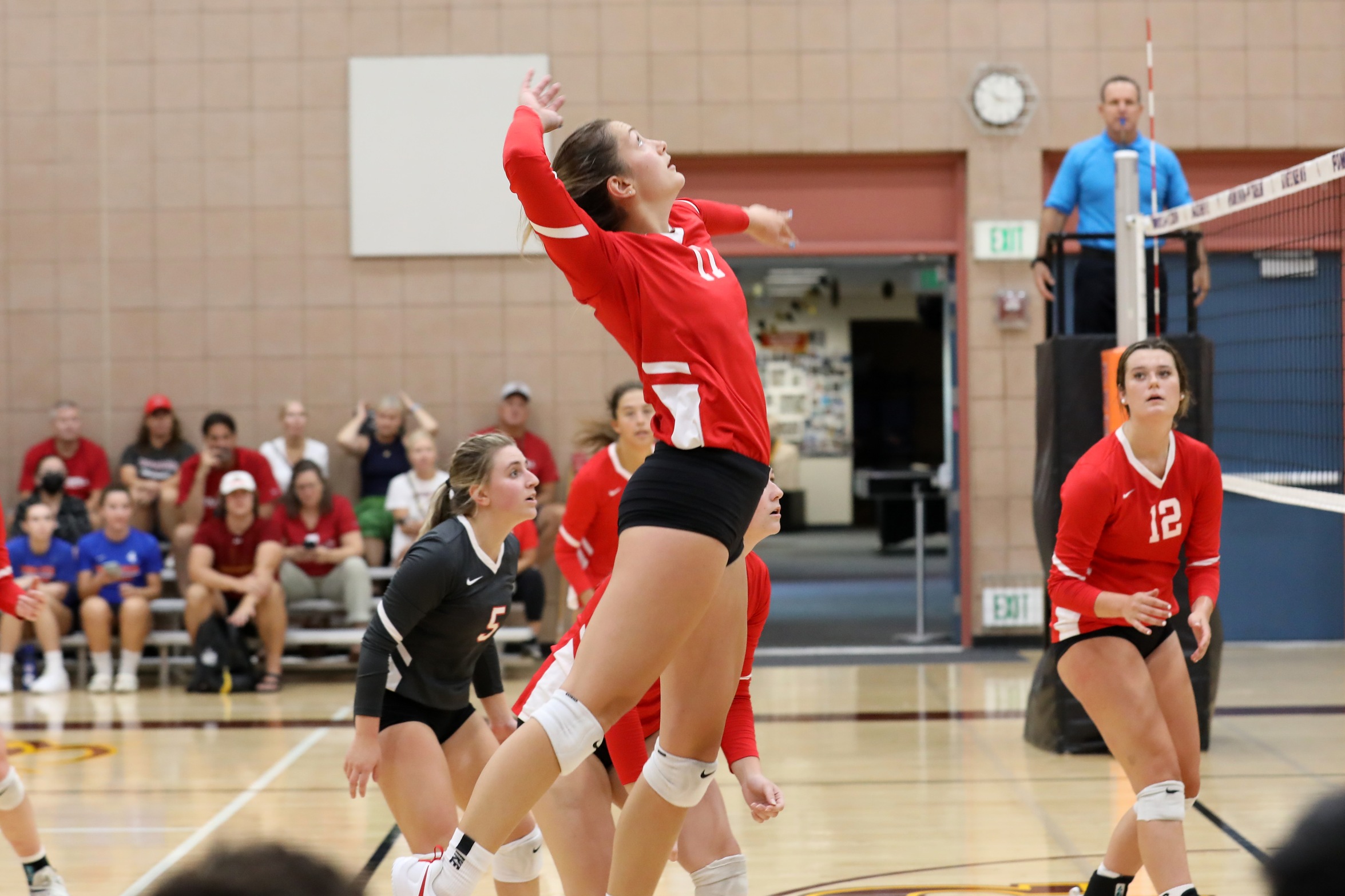 Julin Kenison goes up for an attack at the net.