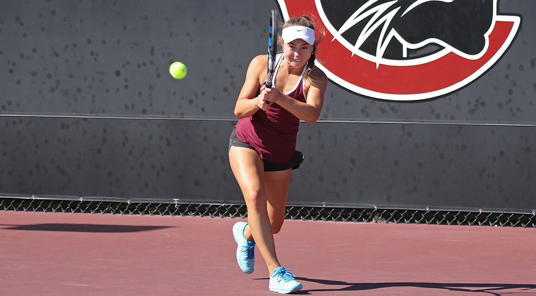 Jordan Craft returns with a backhand.