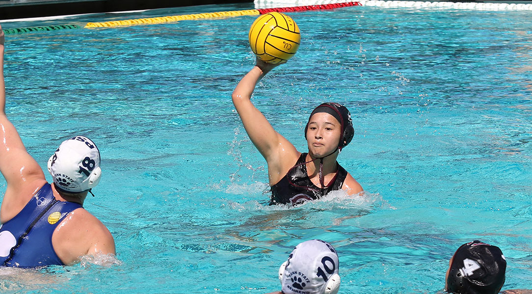 Audrey Hattori looks for a shot over a defender.