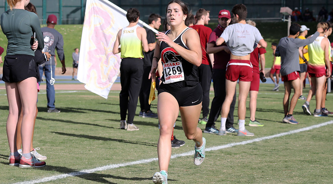 Maddie Mirro crosses the finish line.