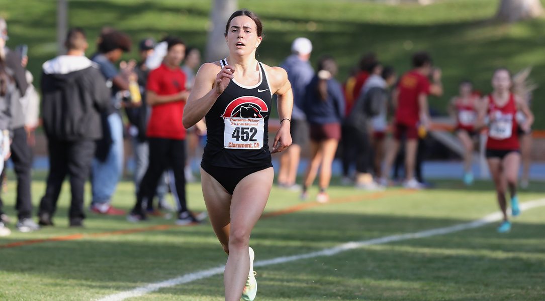 Maddie Mirro runs towards the finish line 