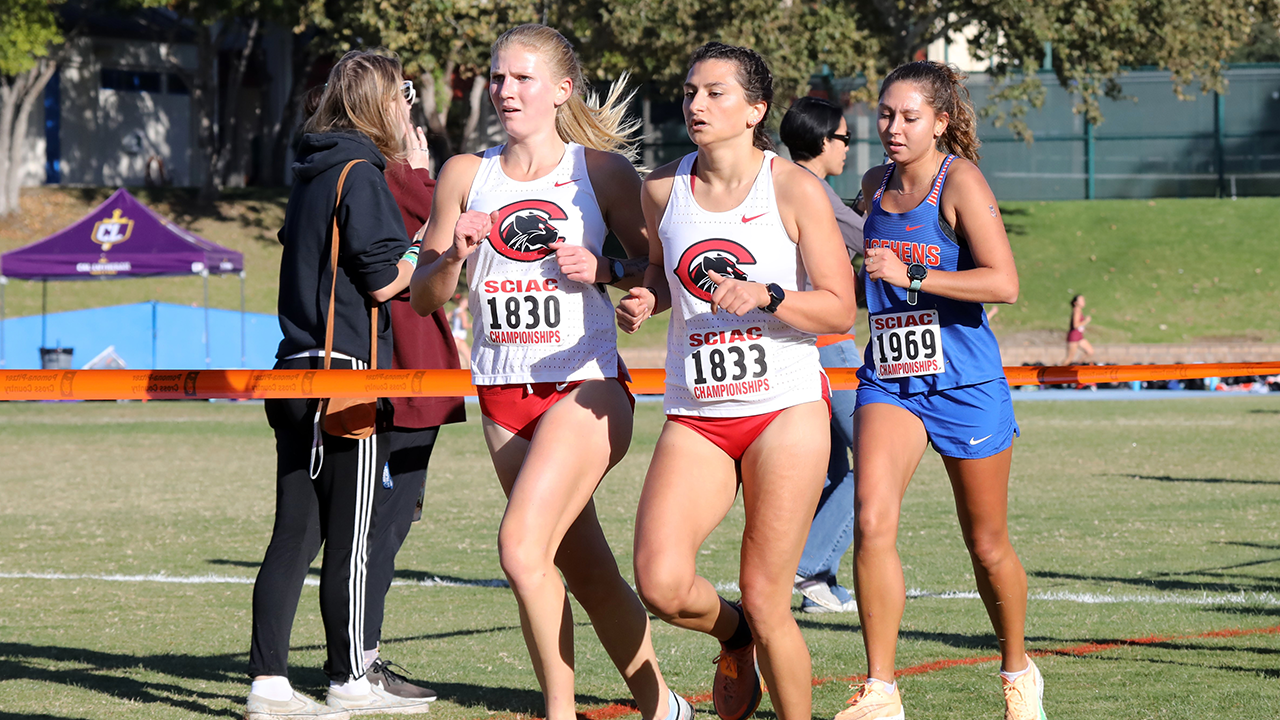 Annika Carlson (left) and Tasha Kotz (right) race at the SCIAC Championships
